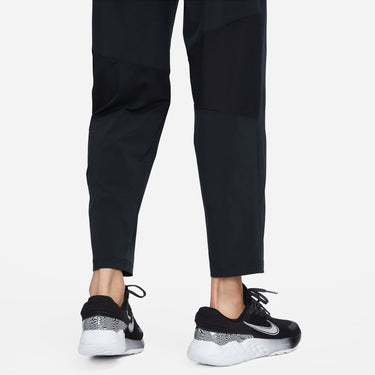 NIKE DRI-FIT FAST  WOMEN'S MID-RISE 7/8 RUNNING PANTS